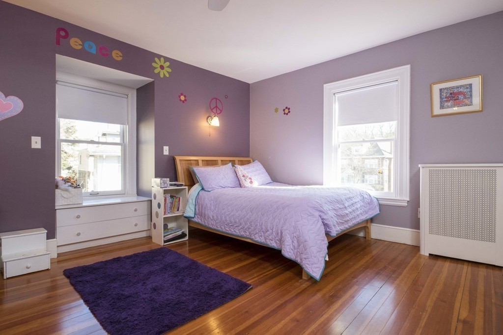 155 Eastbourne Road Newton, MA 02459 - Photo 19 of 25 a spacious bedroom with a bed and wooden floor