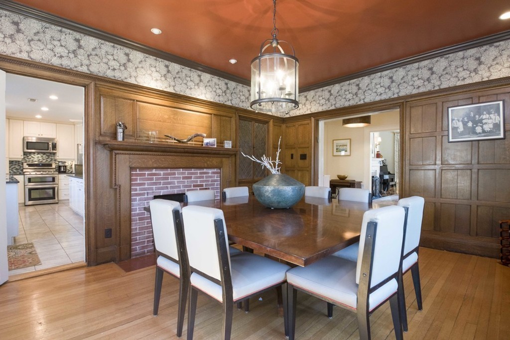 155 Eastbourne Road Newton, MA 02459 - Photo 6 of 25 a dining room with furniture a chandelier and wooden floor