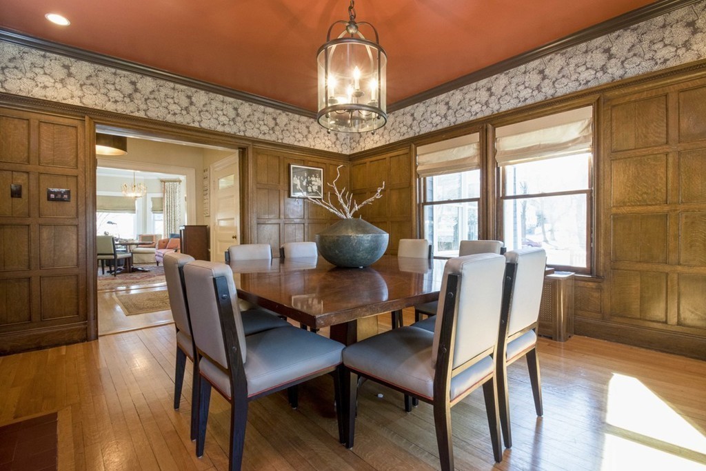 155 Eastbourne Road Newton, MA 02459 - Photo 7 of 25 a dining room with furniture a chandelier and wooden floor