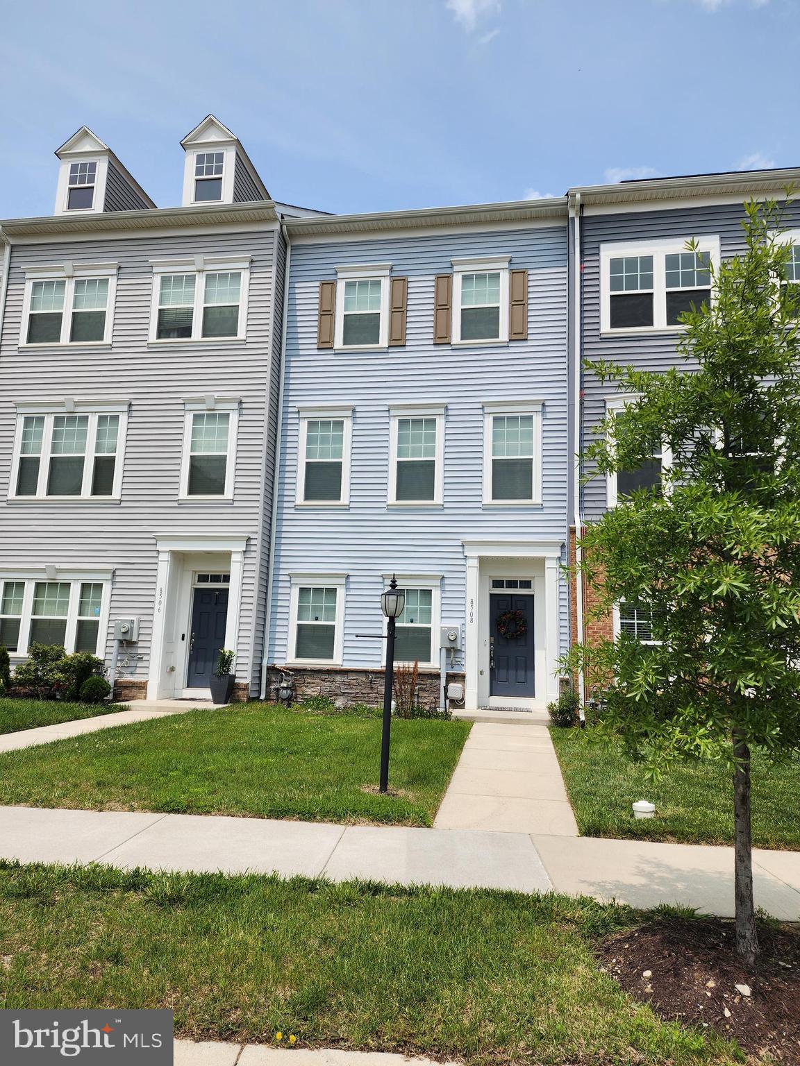 8508 Randell Ridge Road Frederick, MD 21704 - Photo 2 of 4 a front view of a house with yard and green space