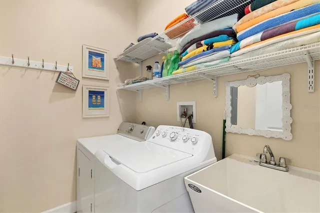 a utility room with dryer and washer