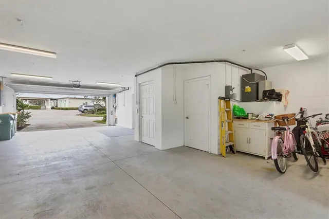 a view of hallway with livingroom and furniture