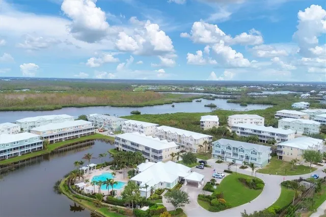 a view of a lake with a yard