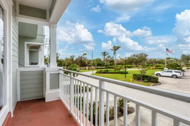 a view of a balcony with city view