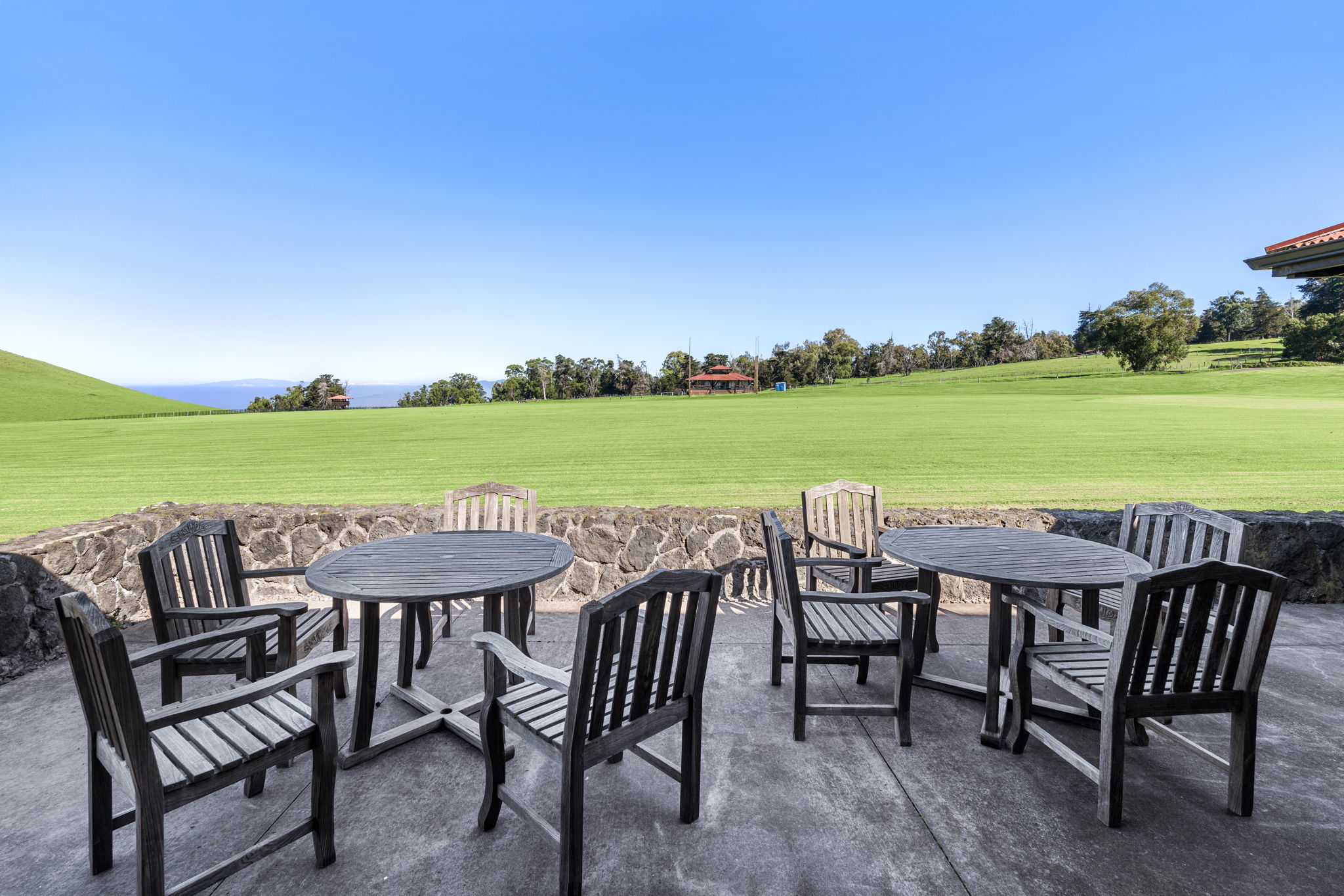 67-1148 Wainoenoe Road Kamuela, HI 96743 - Photo 19 of 28 a table and chairs with the view of back yard