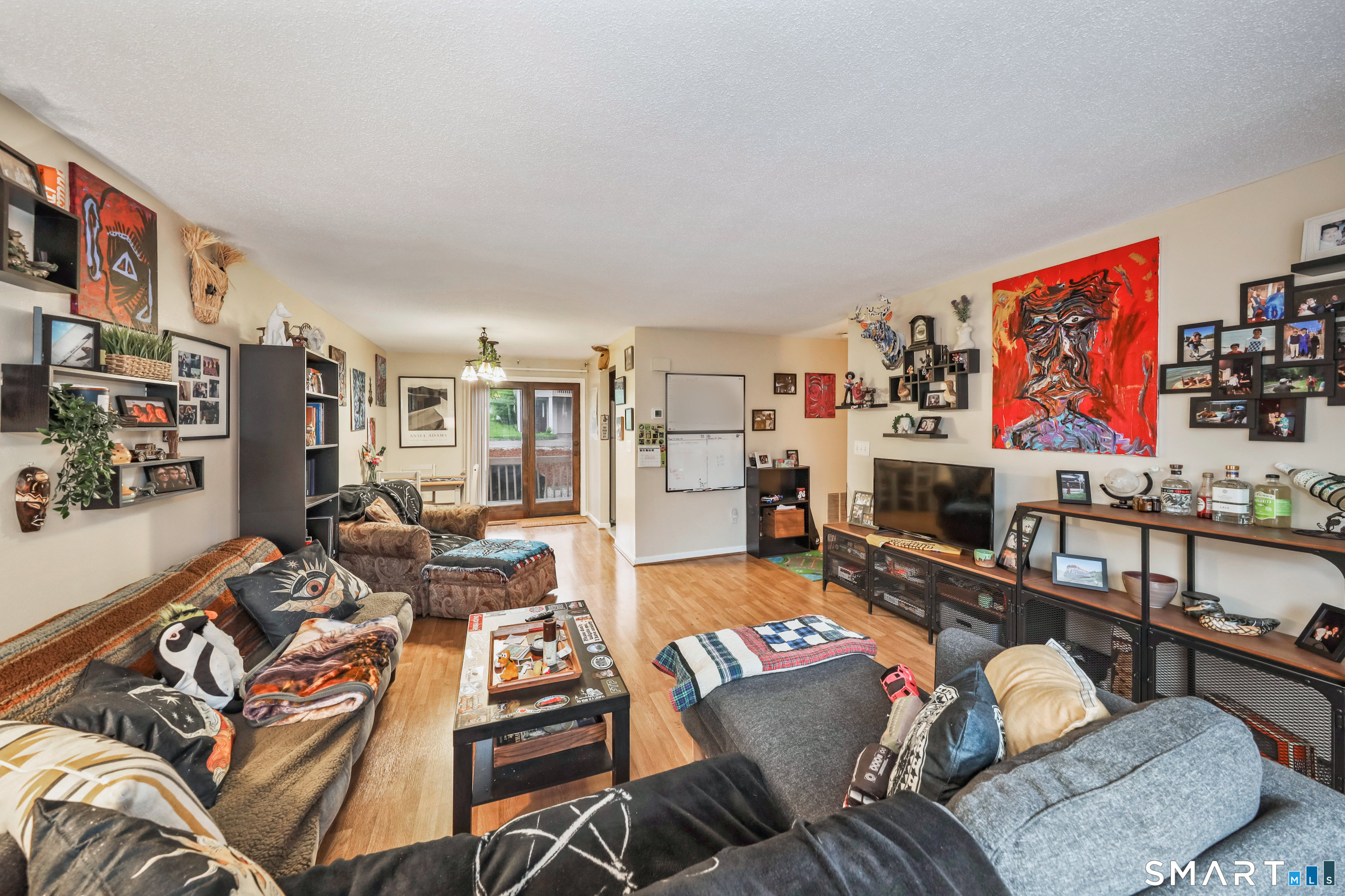 349 Allen Road, Unit 34C Torrington, CT 06790 - Photo 7 of 31 a living room with furniture and a flat screen tv
