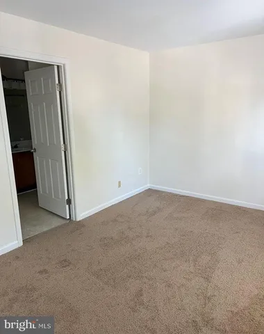 a bathroom with a sink a toilet a mirror and vanity