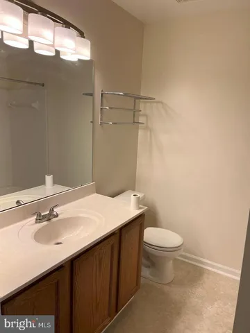 a view of an empty room with stairs