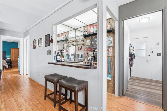 a view of a hallway and dining room