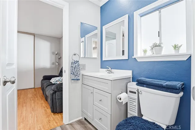 a bathroom with a sink and a washer dryer