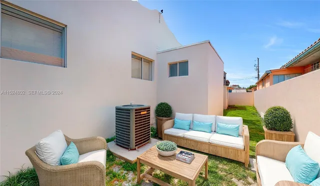 a outdoor living space with furniture and a couch