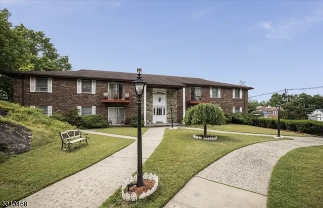 a house view with a garden space
