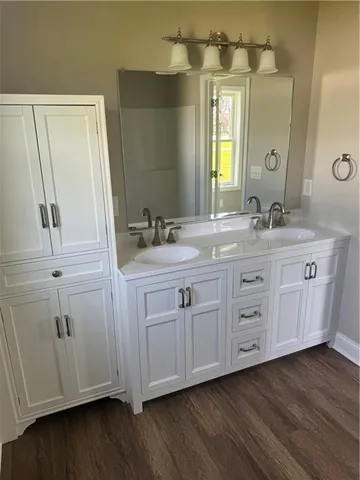 a view of a livingroom with wooden floor