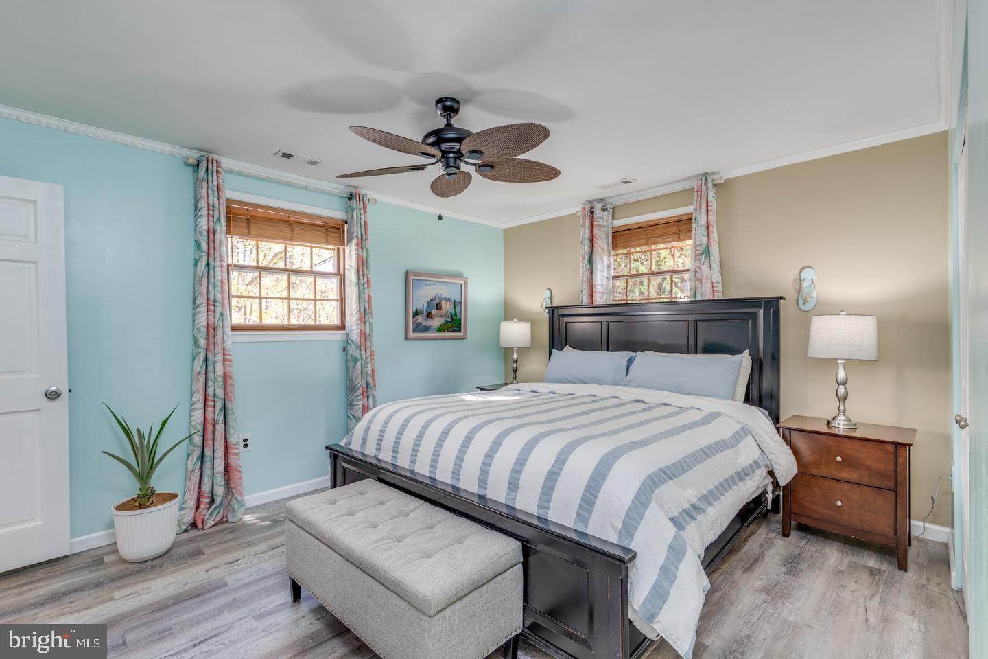 29 Sherri Way Pine Hill, NJ 08021 - Photo 16 of 28 a bedroom with a bed and wooden floor