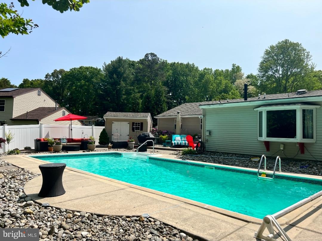 29 Sherri Way Pine Hill, NJ 08021 - Photo 20 of 28 a view of a backyard with sitting area and furniture