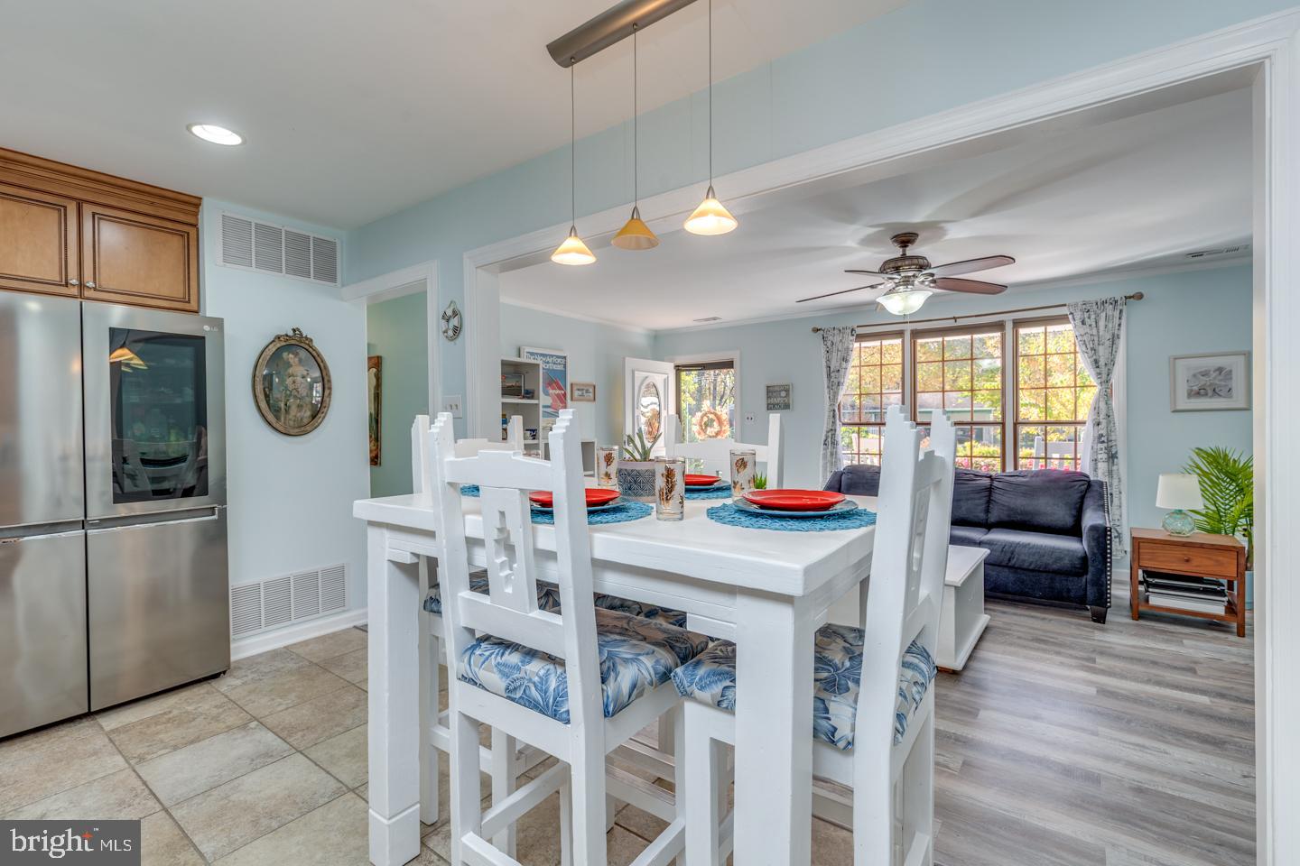 29 Sherri Way Pine Hill, NJ 08021 - Photo 7 of 28 a view of a dining room with furniture window and wooden floor