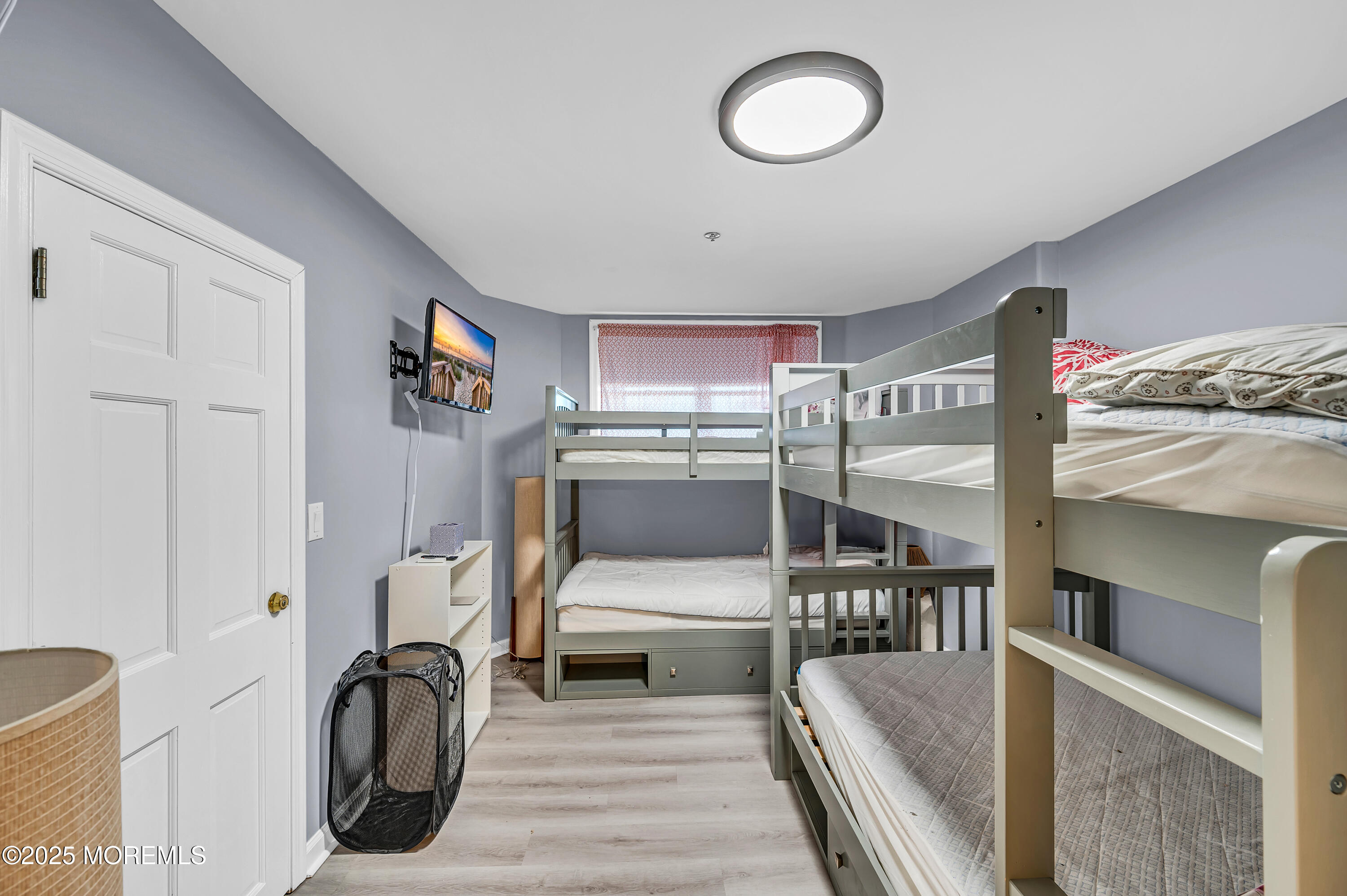 15 East Tuna Way, Unit B Lavallette, NJ 08735 - Photo 23 of 33 a living room with furniture and a flat screen tv