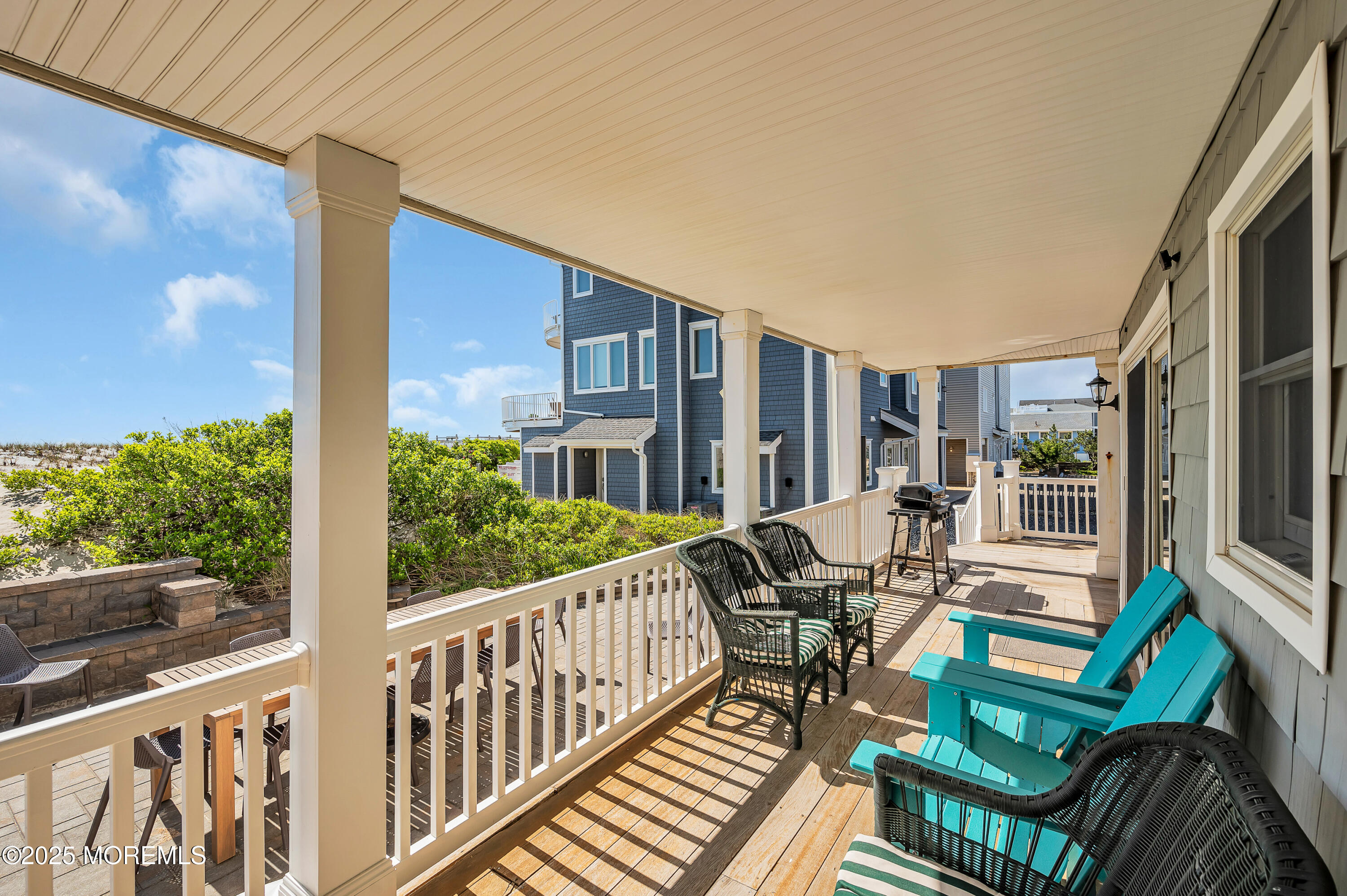 15 East Tuna Way, Unit B Lavallette, NJ 08735 - Photo 27 of 33 a view of a balcony with chairs