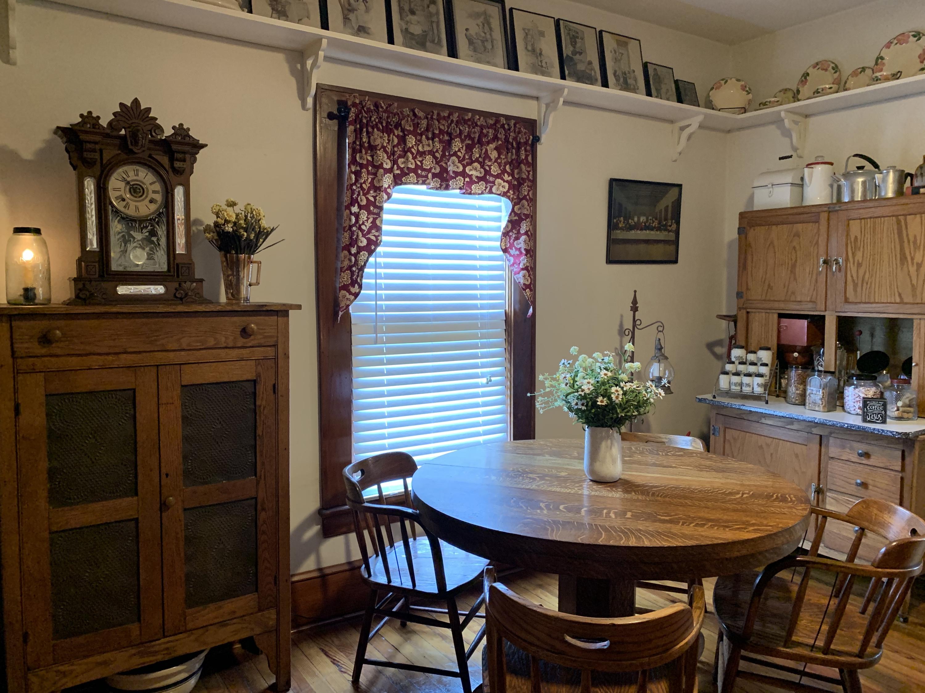1763 Morgans Mill Road Goodview, VA 24095 - Photo 16 of 46 a view of a dining room with furniture and wooden floor