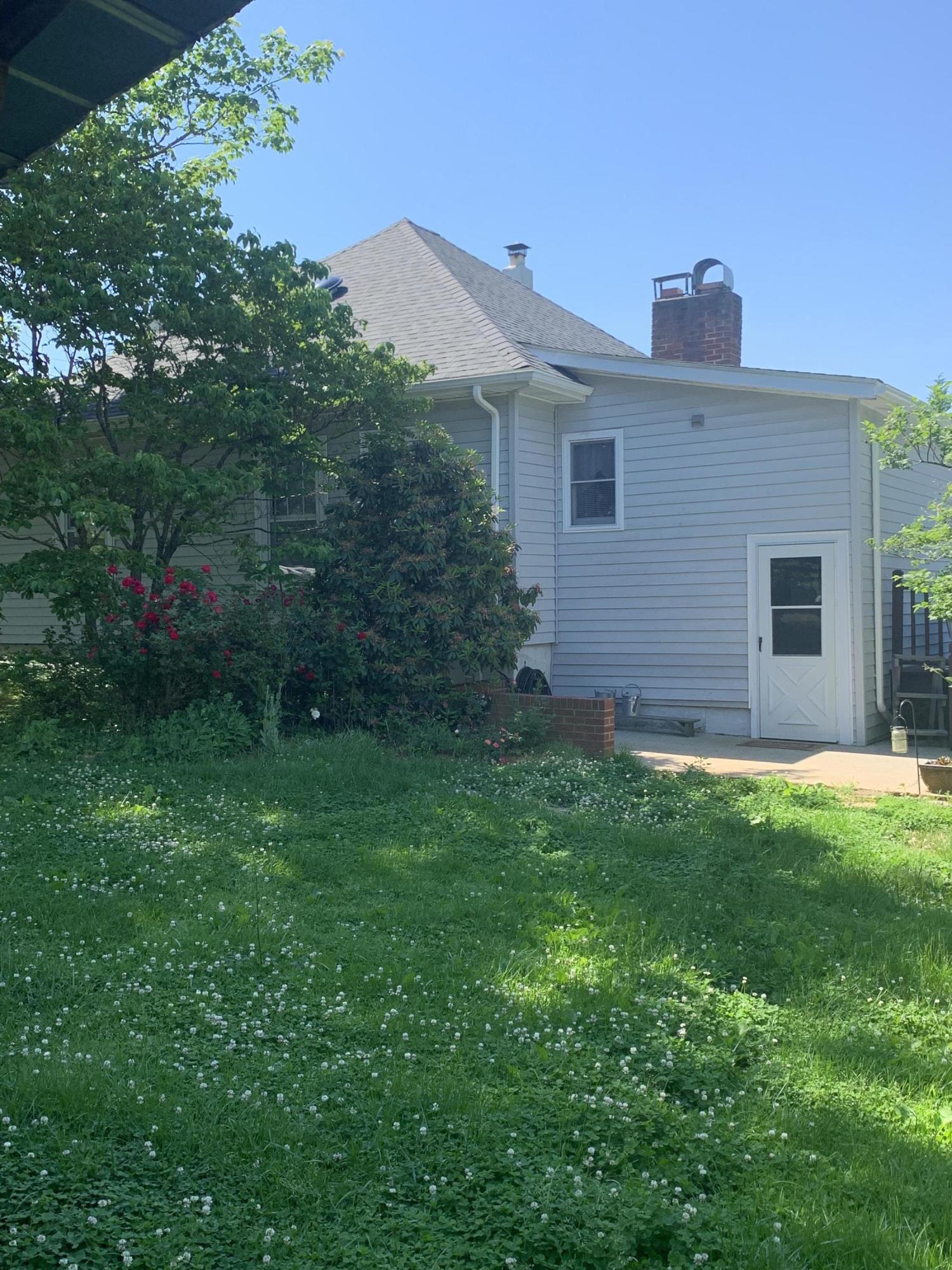 1763 Morgans Mill Road Goodview, VA 24095 - Photo 21 of 46 a view of a house with yard