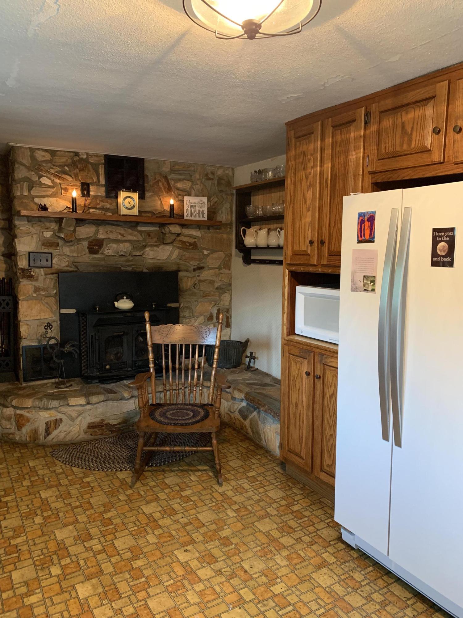 1763 Morgans Mill Road Goodview, VA 24095 - Photo 34 of 46 a kitchen with refrigerator and window
