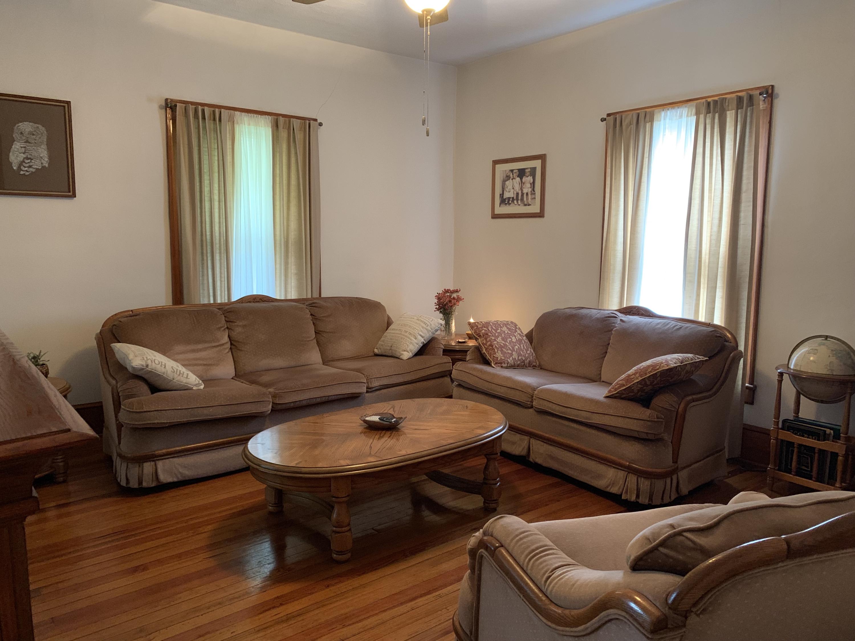 1763 Morgans Mill Road Goodview, VA 24095 - Photo 42 of 46 a living room with furniture and a window