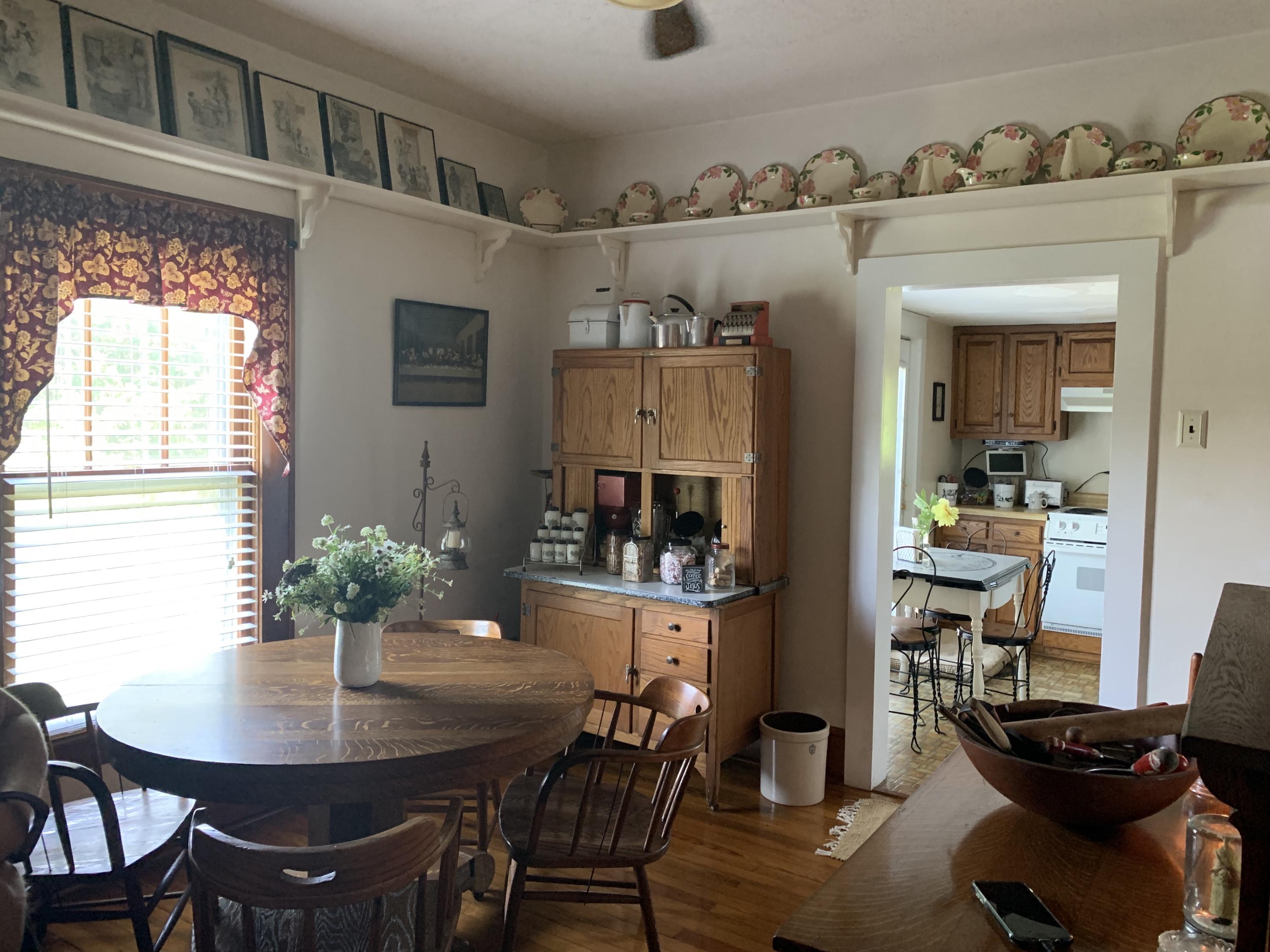 1763 Morgans Mill Road Goodview, VA 24095 - Photo 8 of 46 a view of a dining room with furniture and window