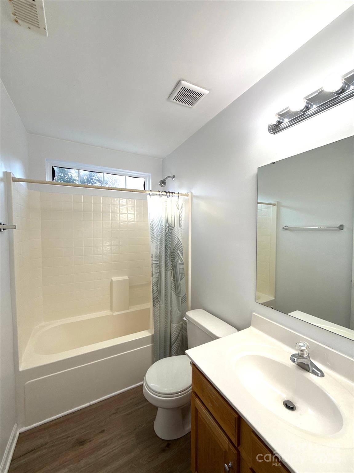 3415 Cole Mill Road Charlotte, NC 28270 - Photo 14 of 18 a bathroom with a sink a toilet and shower