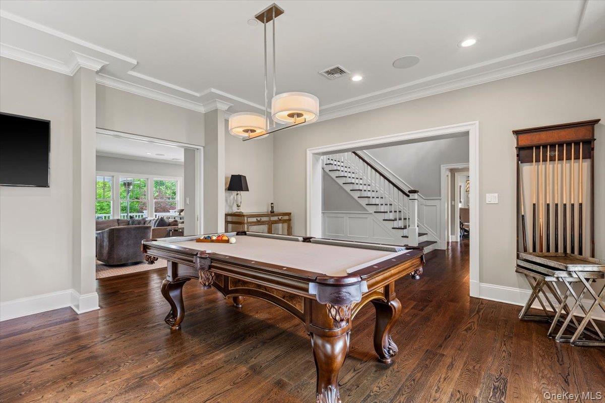 81 Wappanocca Avenue Rye, NY 10580 - Photo 4 of 27 Rec room with crown molding, pool table, wood finished floors, and recessed lighting