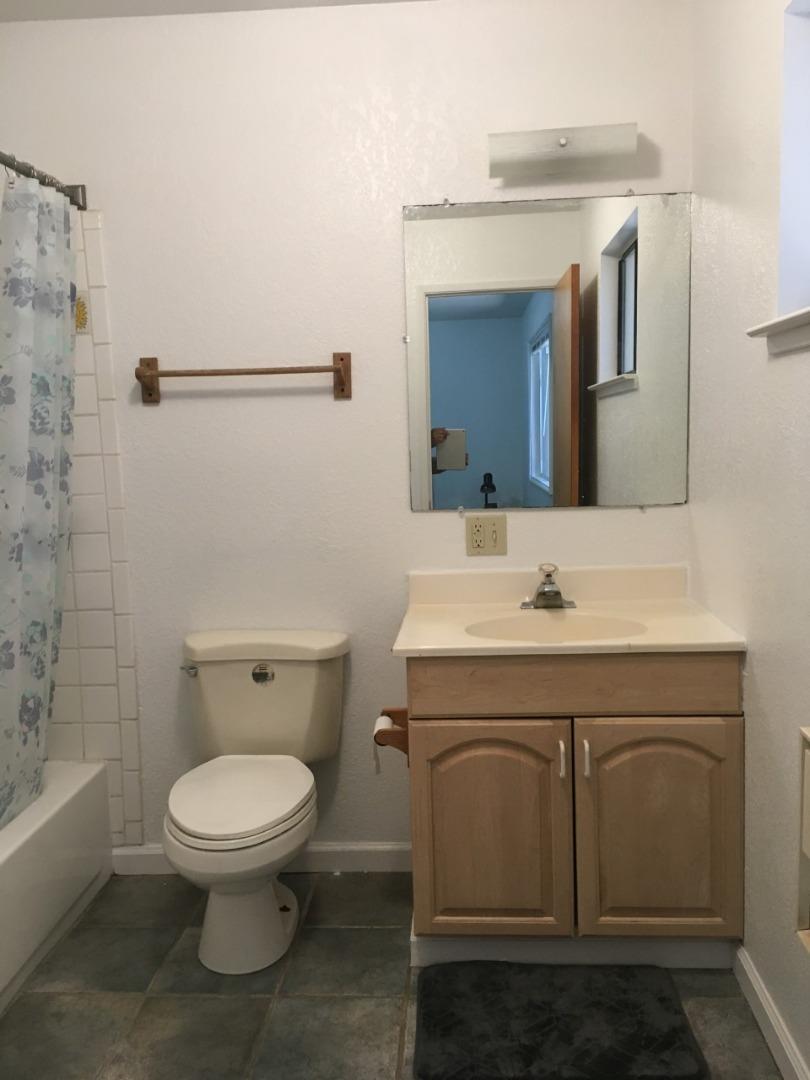 4020 Ridge Circle Willits, CA 95490 - Photo 19 of 44 a bathroom with a toilet a sink and mirror