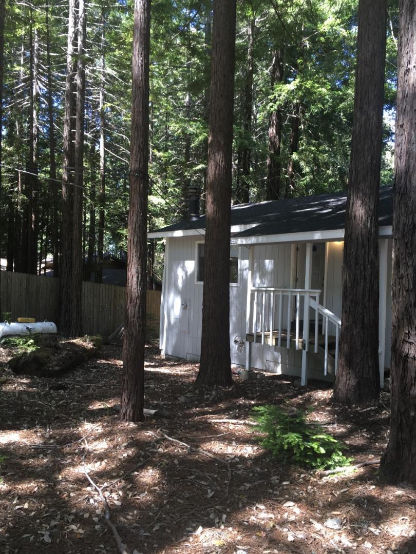 4020 Ridge Circle Willits, CA 95490 - Photo 2 of 44 a view of a house with backyard and trees
