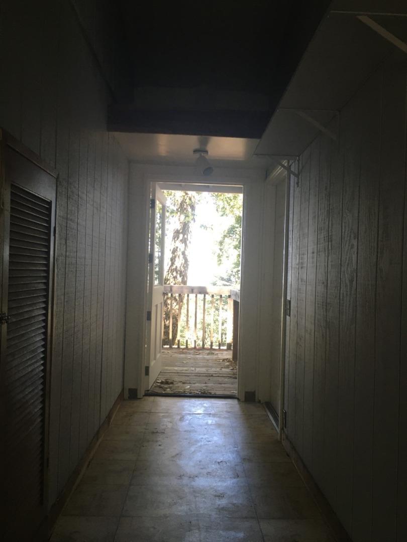 4020 Ridge Circle Willits, CA 95490 - Photo 28 of 44 an empty room with wooden floor and windows