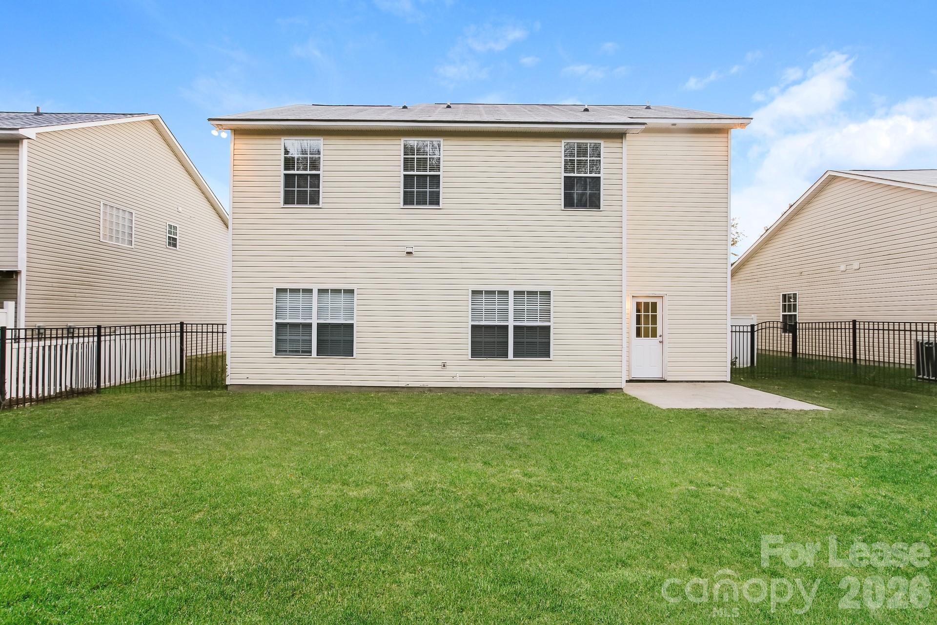 8812 Cornwall Street Locust, NC 28097 - Photo 15 of 15 a view of a backyard of the house