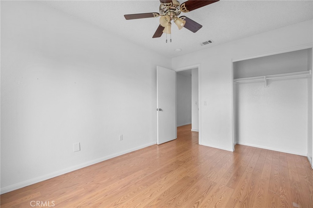 5423 Dunlop Drive Riverside, CA 92505 - Photo 24 of 28 a view of an empty room and wooden floor