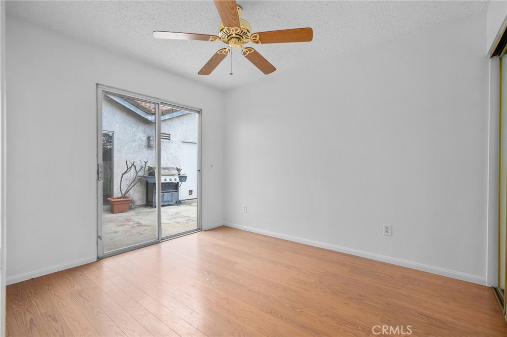5423 Dunlop Drive Riverside, CA 92505 - Photo 25 of 28 an empty room with fan and entrance