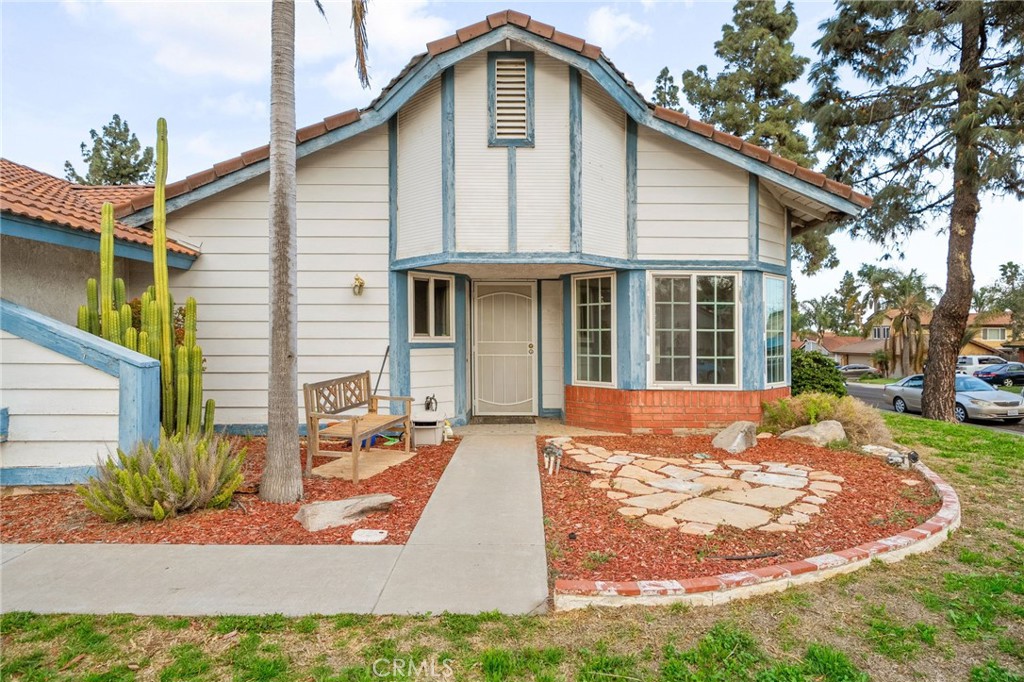 5423 Dunlop Drive Riverside, CA 92505 - Photo 4 of 28 a front view of a house with a yard
