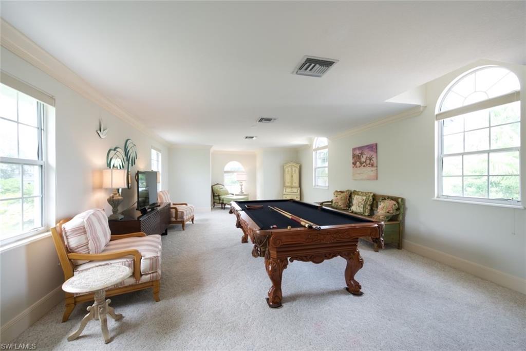 649 Bow Line Drive Naples, FL 34103 - Photo 26 of 31 a living room with furniture and a window