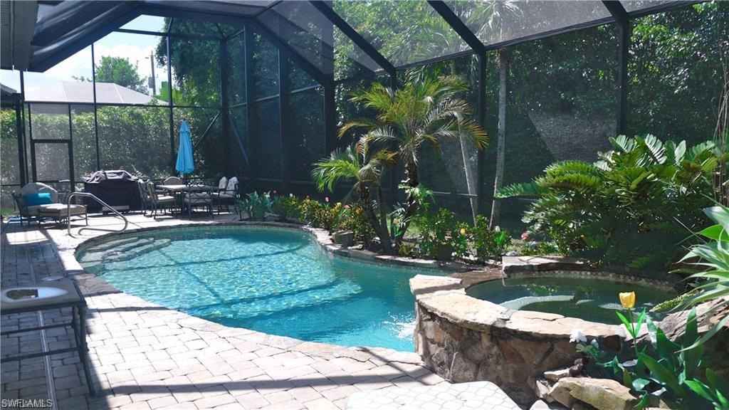 649 Bow Line Drive Naples, FL 34103 - Photo 3 of 31 a view of a couches in patio of a house