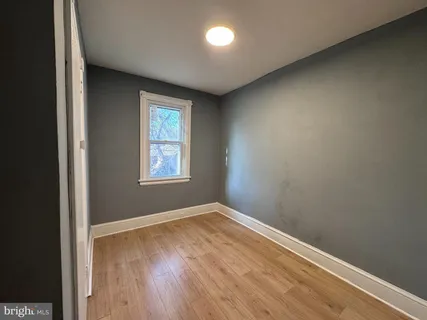 a bathroom with a sink toilet and tub