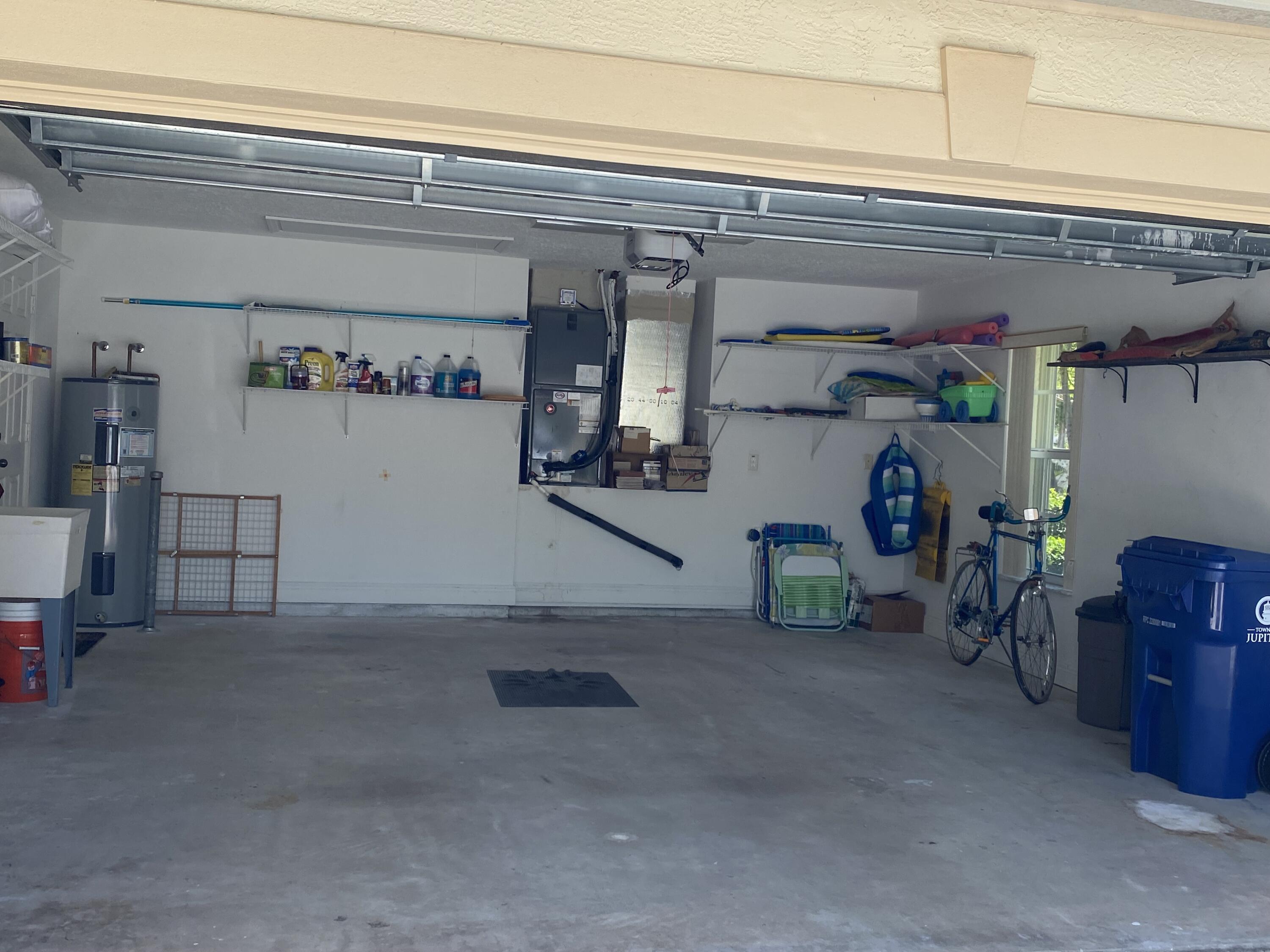 225 Clocktower Drive Jupiter, FL 33458 - Photo 27 of 40 a view of storage and utility room