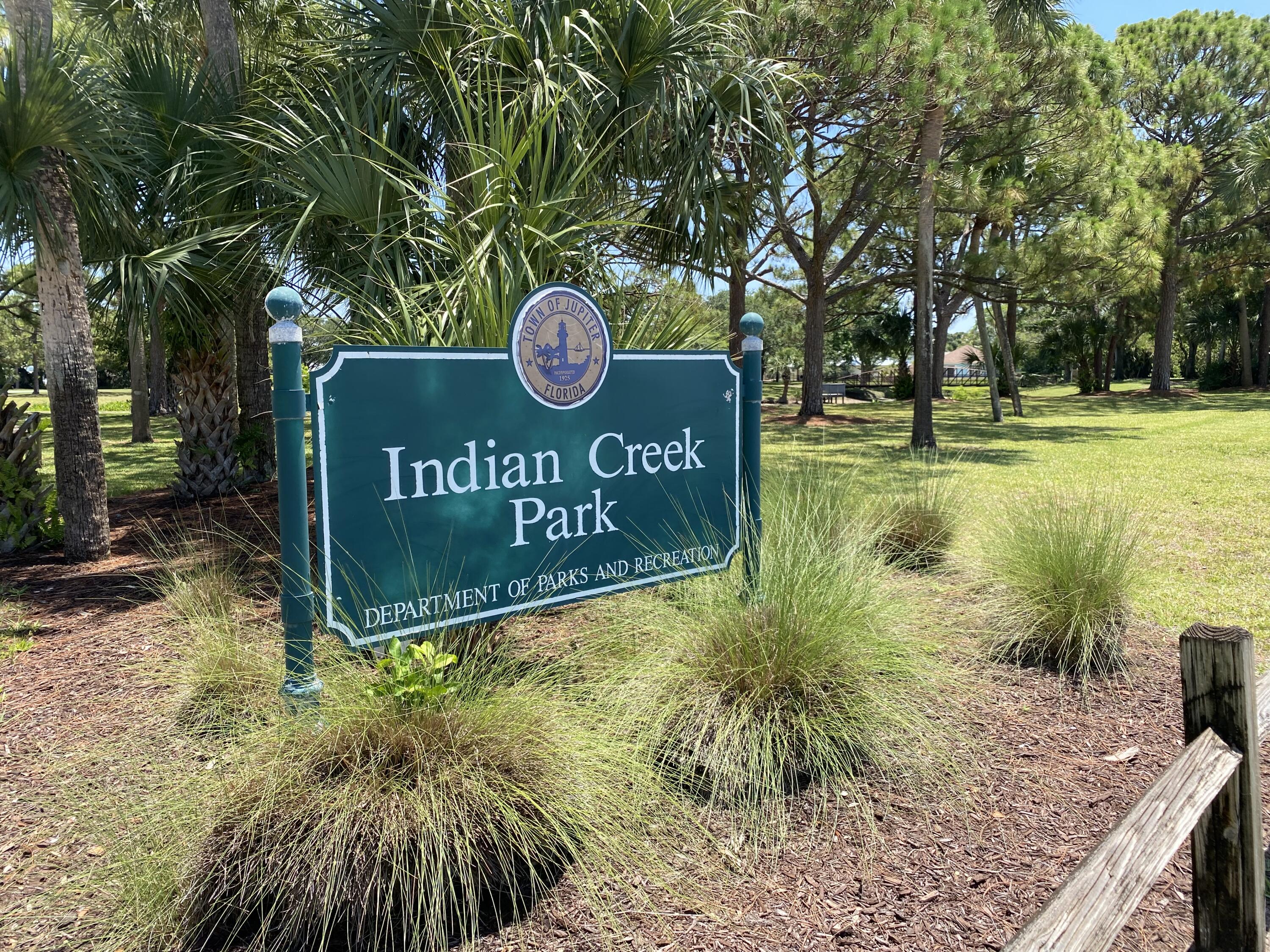 225 Clocktower Drive Jupiter, FL 33458 - Photo 30 of 40 a view of outdoor space with sign board