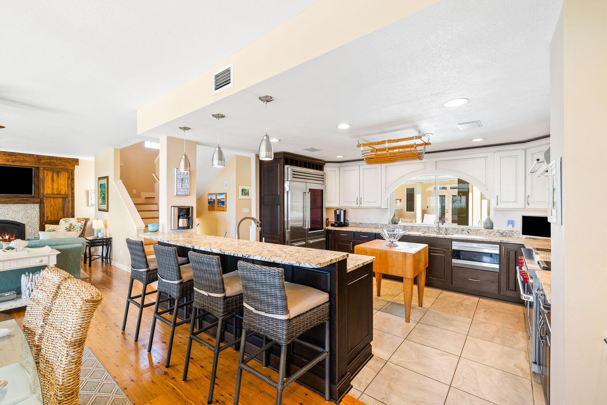 24 Bramble Grove Place Santa Rosa Beach, FL 32459 - Photo 36 of 89 a room with stainless steel appliances kitchen island granite countertop furniture and a view of kitchen
