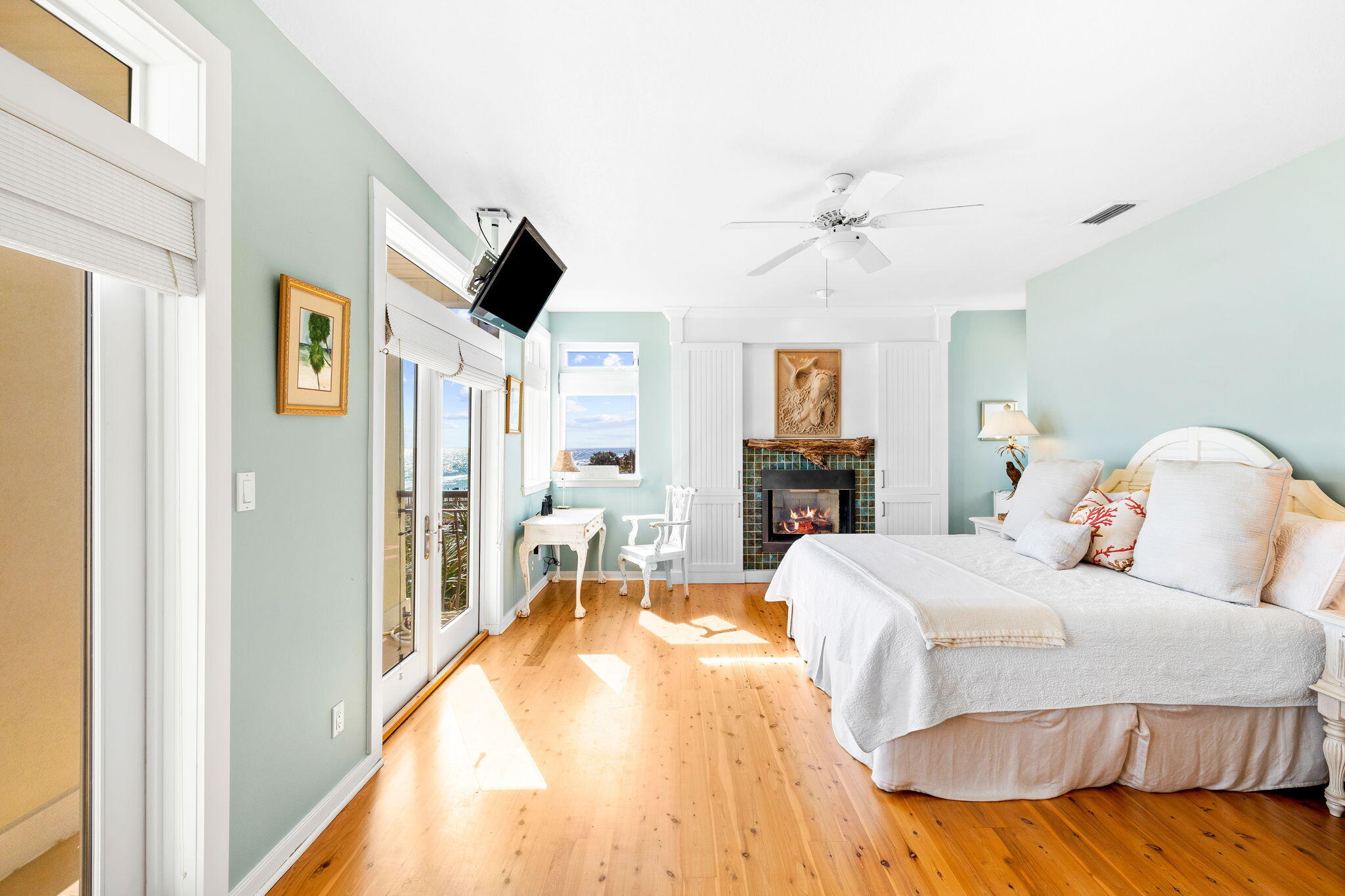 24 Bramble Grove Place Santa Rosa Beach, FL 32459 - Photo 50 of 89 a bedroom with a bed and a chandelier