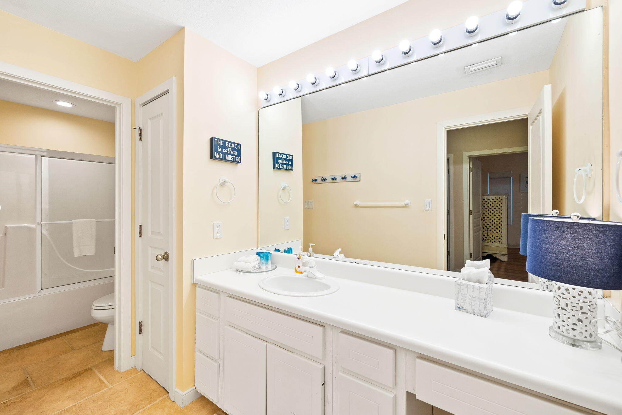 24 Bramble Grove Place Santa Rosa Beach, FL 32459 - Photo 66 of 89 a bathroom with a sink and a mirror