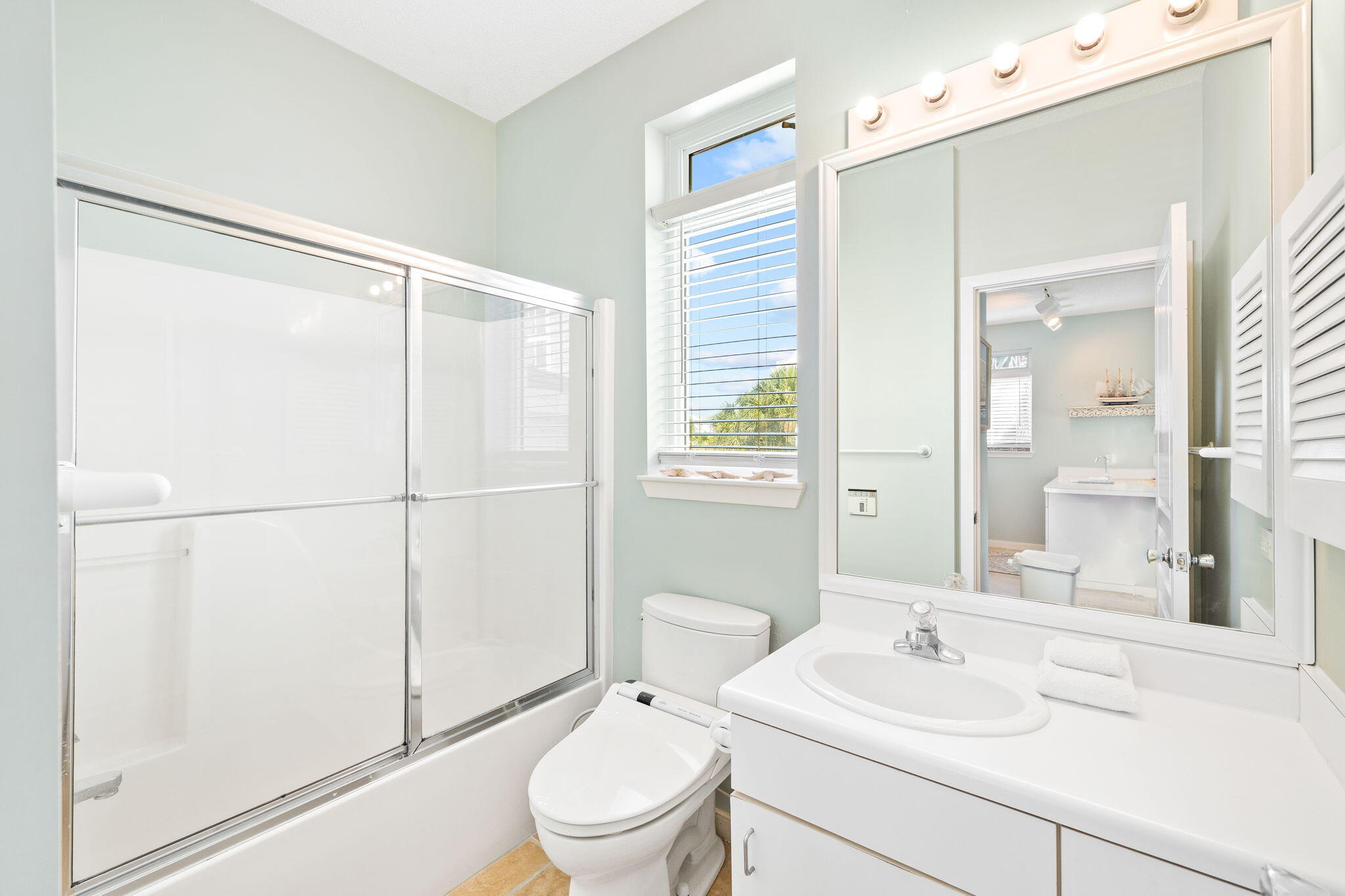 24 Bramble Grove Place Santa Rosa Beach, FL 32459 - Photo 83 of 89 a bathroom with a sink a toilet and shower
