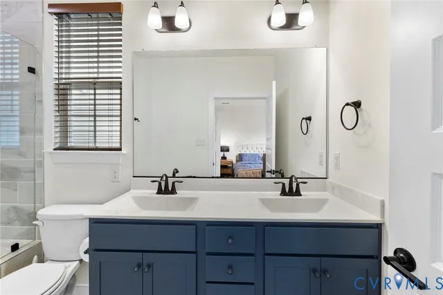 a room with furniture and flat screen tv