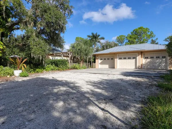 a house with trees in the background
