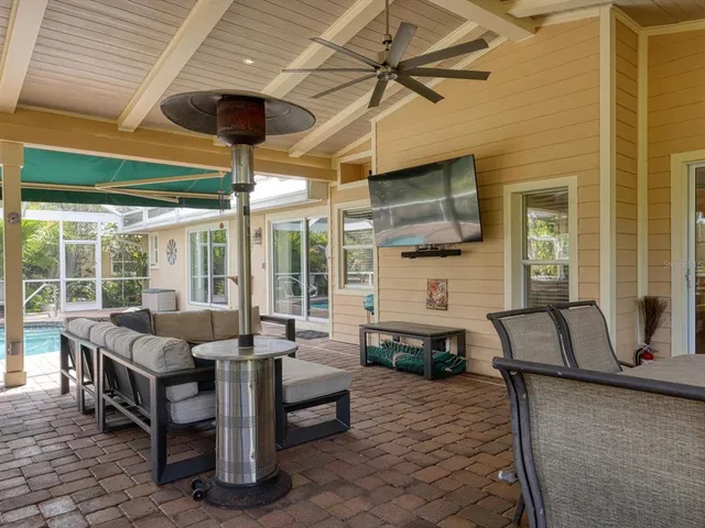 a kitchen with a sink and a large window