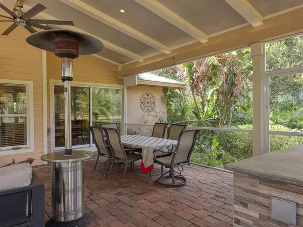 a view of an house with backyard space and garden