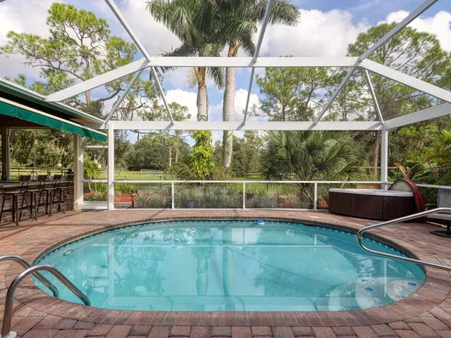 a view of a garden with a house